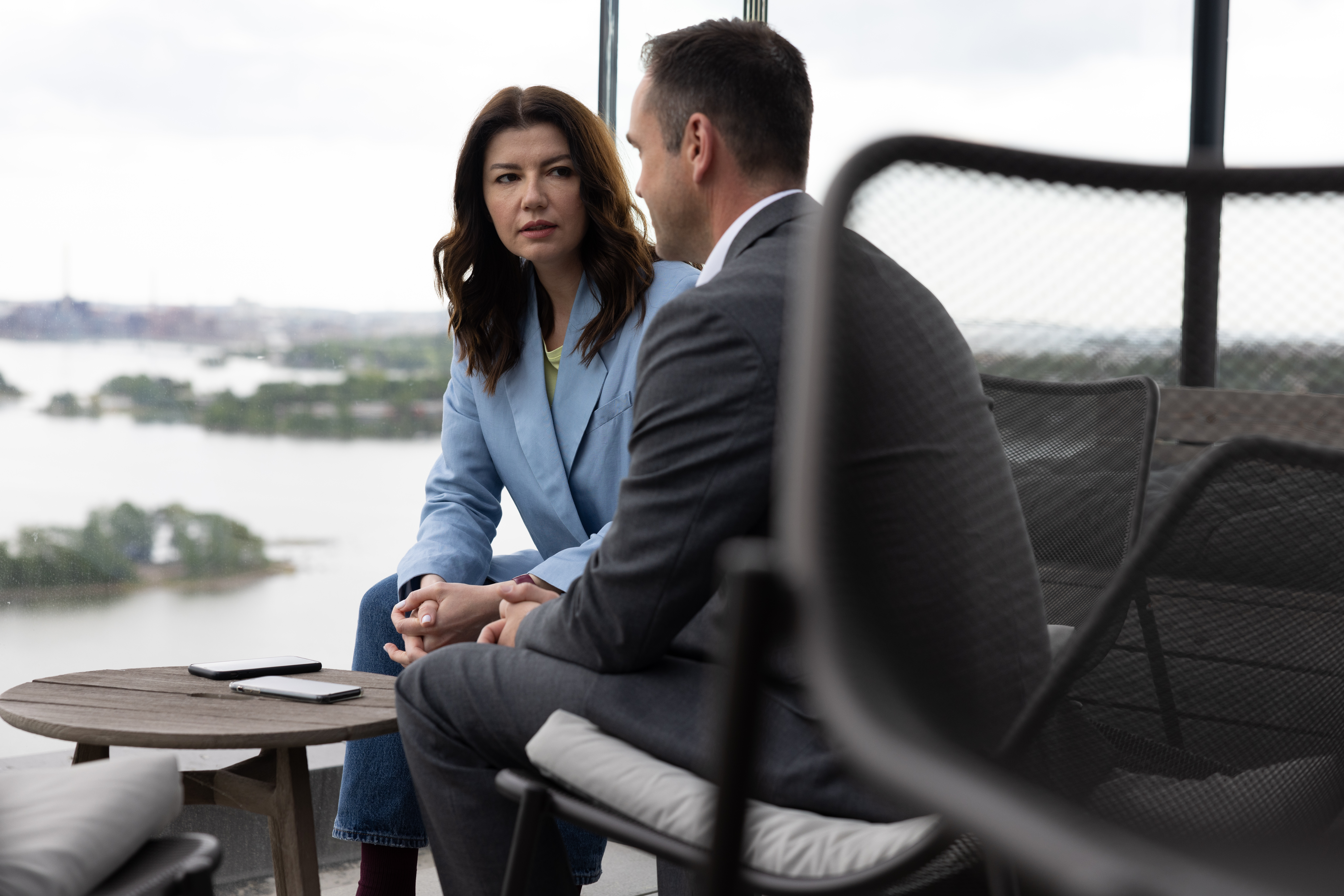 Lady and gentleman sitting and talking