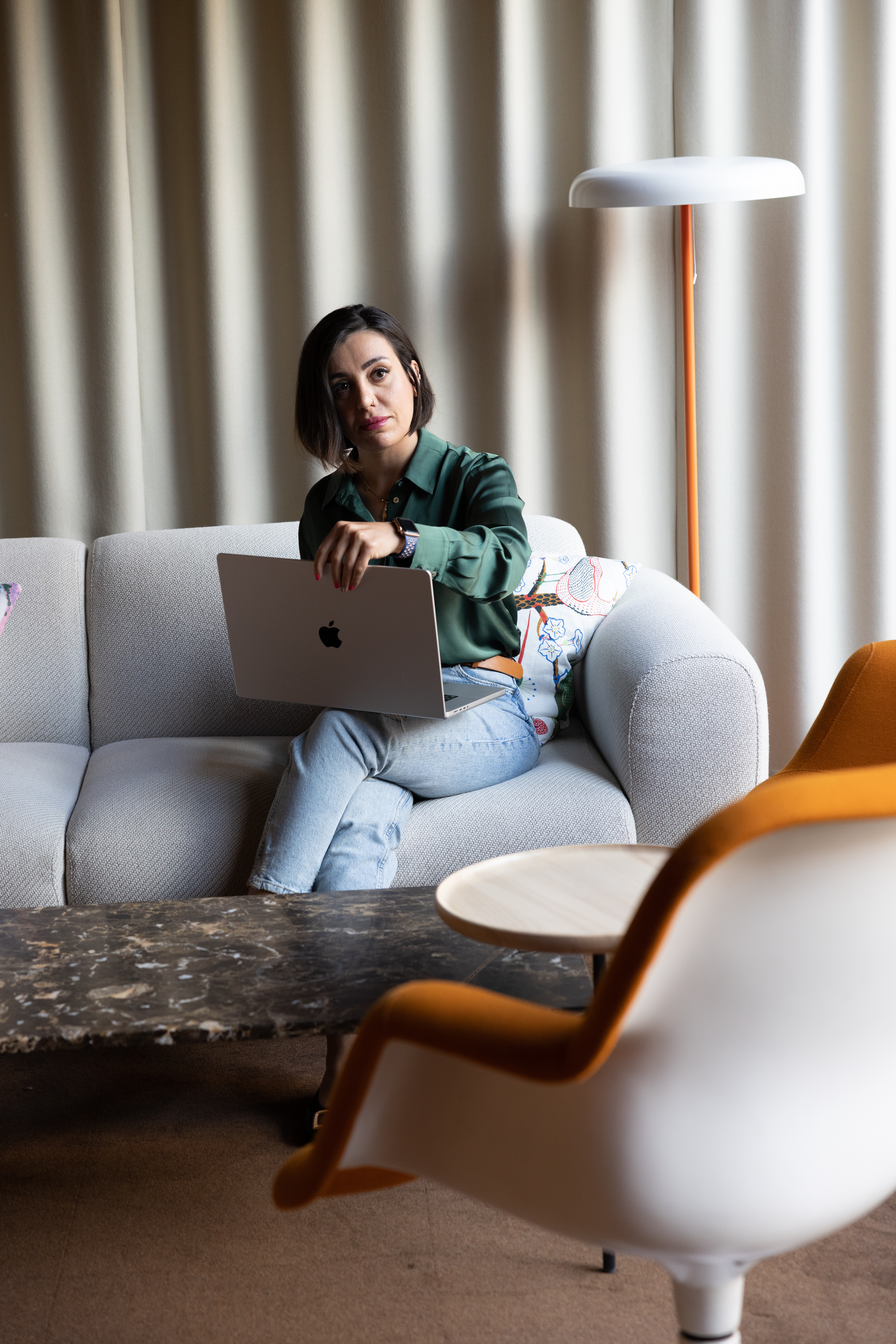 woman on the sofa with laptop