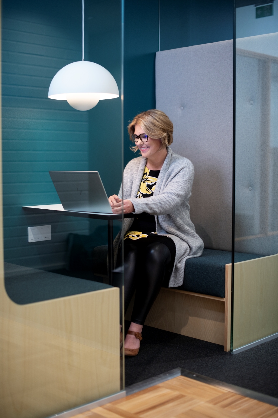 green working booth woman